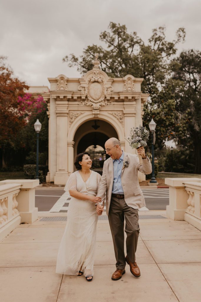Bride and Groom walking through Balboa Park San Diego