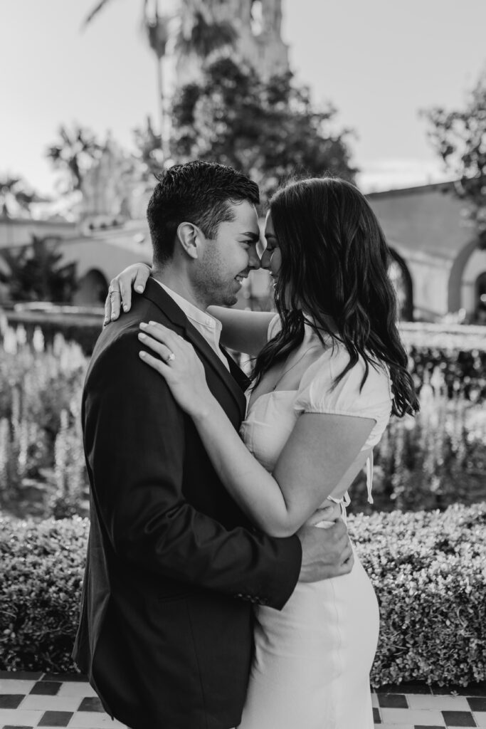 engagement photos in the Alcazar Garden at Balboa Park